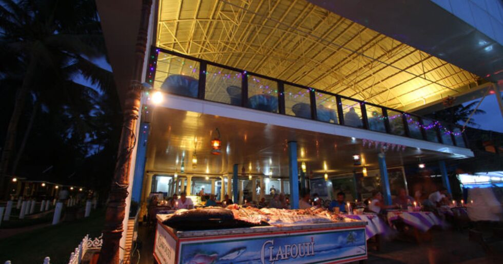 Interior seating at Clafouti Restaurant Varkala