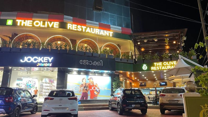 The Olive Restaurant in Calicut offers multi-cuisine dishes and a modern dining ambience