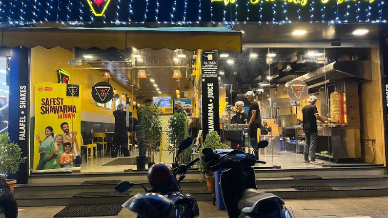 AL TAZA restaurant in Palakkad serving Arabian-style grilled chicken, shawarma, and flavorful fast food.