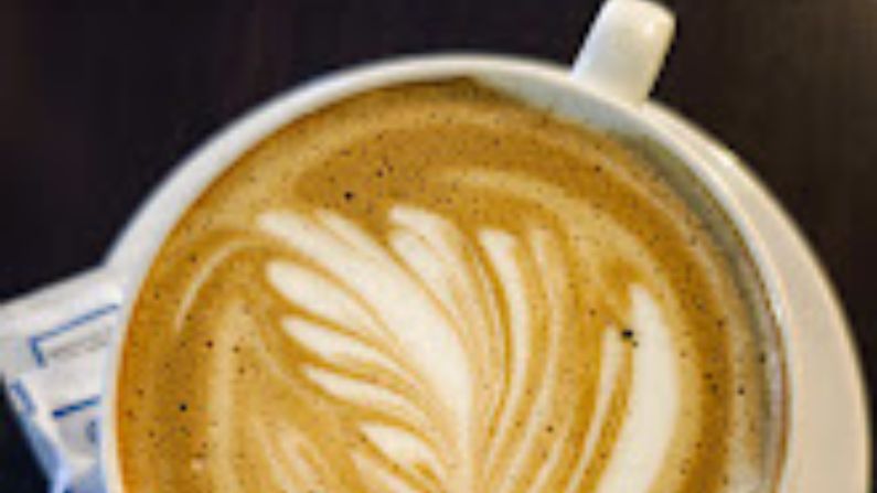 Cozy café interior with coffee and snacks at Cofi Club.