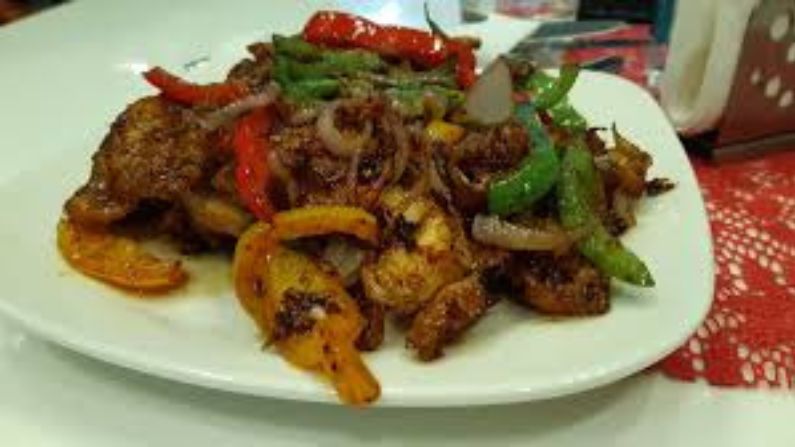 Urban Grills Restaurant in Mangalapuram serving grilled dishes, Kerala cuisine, and family meals.