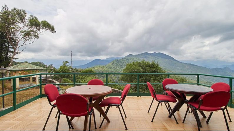 KTDC Orchid Restaurant in Ponmudi serving vegetarian Kerala food with scenic hill views