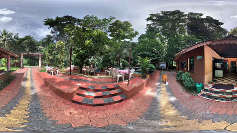 Ponmudi River Restaurant offering Kerala cuisine in a scenic riverside setting